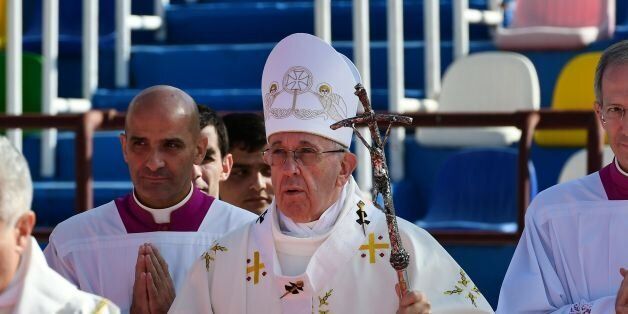Pope Francis (C) arrives for a Holy Mass at the stadium in Tbilisi on October 1, 2016.Pope Francis landed in Georgia on September 30 for a visit billed as a mission of peace to the volatile Caucasus region that will also take him to Azerbaijan just months after he visited neighbouring Armenia. / AFP / VINCENZO PINTO        (Photo credit should read VINCENZO PINTO/AFP/Getty Images)
