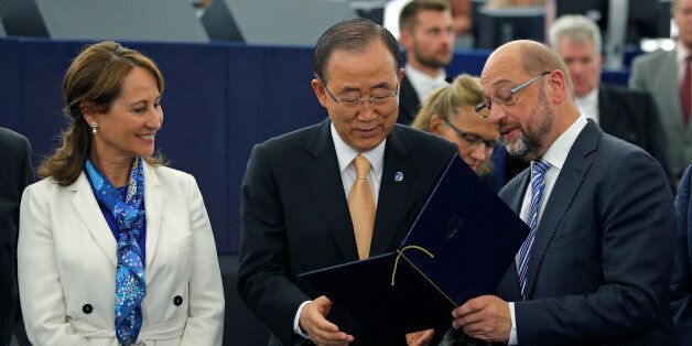 French Minister for Environment and President of the COP 21 Segolene Royal (L), U.N. Secretary General Ban Ki-moon (C), and European Parliament President Martin Schulz pose for a picture after the vote in favor of the Paris U.N. COP 21 Climate Change agreement of the European Parliament in Strasbourg, October 4, 2016. REUTERS/Vincent Kessler