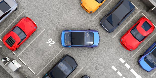 Aerial view of parking lot. Half of parking lot available for EV charging service. 3D rendering image.