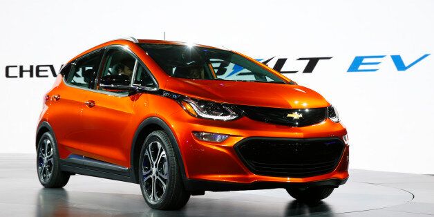 FILE - In this Monday, Jan. 11, 2016, file photo, the Chevrolet Bolt EV debuts at the North American International Auto Show in Detroit. Automakers now say hybrid and electric vehicles perform better than gas-powered vehicles. (AP Photo/Paul Sancya, File)