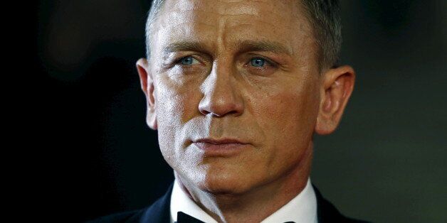 Daniel Craig poses for photographers as he attends the world premiere of the new James Bond 007 film