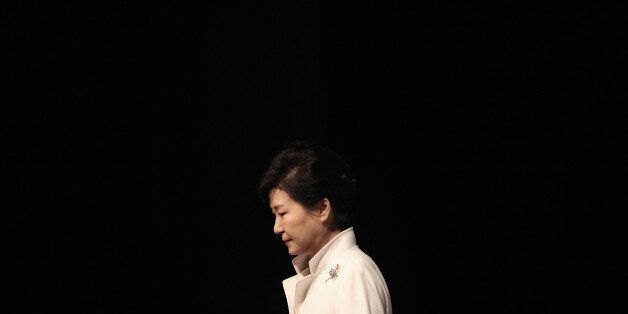 South Korean President Park Geun-hye leaves after a ceremony to celebrate the March First Independence Movement Day, the anniversary of the 1919 uprising against Japanese colonial rule, in Seoul, South Korea, Tuesday, March 1, 2016. (AP Photo/Ahn Young-joon)
