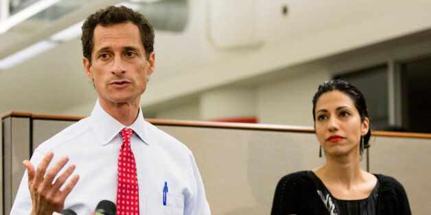 FILE - In this July 23, 2013 file photo, then-New York mayoral candidate Anthony Weiner speaks during a news conference alongside his wife Huma Abedin in New York. The FBI informed Congress on Friday, Oct. 28, 2016, it is investigating whether there is classified information in new emails that have emerged in its probe of Hillary Clinton's private server. A U.S. official told The Associated Press the newly discovered emails emerged through the FBIâs separate sexting probe of former congress
