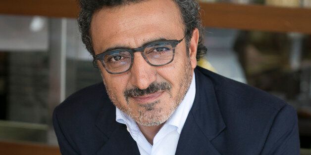 IMAGE DISTRIBUTED FOR CHOBANI, LLC - In this image released on Thursday, May 28, 2015, Chobani's founder and CEO Hamdi Ulukaya at the Chobani Soho cafÃ© in New York. (Mark Von Holden/AP Images for Chobani, LLC)