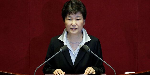 South Korean President Park Geun-hye delivers her speech on the 2017 budget bill during a plenary session at the National Assembly in Seoul, South Korea, October 24, 2016.  REUTERS/Kim Hong-Ji