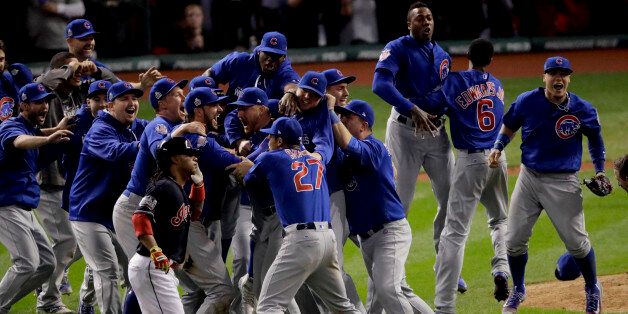 Chicago Cubs celebrate after Game 7 of the Major League Baseball World Series Thursday, Nov. 3, 2016, in Cleveland. The Cubs won 8-7 in 10 innings to win the series 4-3. (AP Photo/Charlie Riedel)