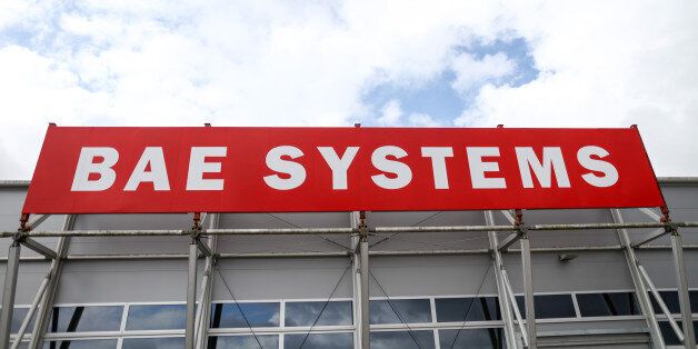 The BAE Systems Plc logo stands on display on the second day of the Farnborough International Airshow 2016 in Farnborough, U.K., on Tuesday, July 12, 2016. The air show, a biannual showcase for the aviation industry, runs until July 17. Photographer: Simon Dawson/Bloomberg via Getty Images