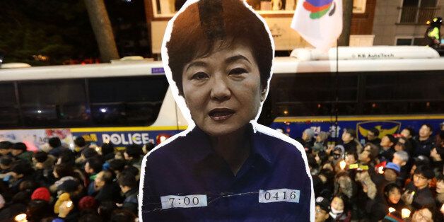 SEOUL, SOUTH KOREA - DECEMBER 03:  Protesters gather and occupy major streets in the city center for a rally against South Korean President Park Geun-hye on December 3, 2016 in Seoul, South Korea. Park addressed to the nation this week that she would leave it to the Parliament to decide if she should step down from her presidency after her friend Choi Soon-sil was charged with corrupt influence over state affairs.  (Photo by Chung Sung-Jun/Getty Images)