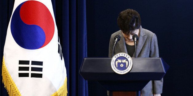 South Korean President Park Geun-Hye bows during an address to the nation, at the presidential Blue House in Seoul, South Korea, 29 November 2016. REUTERS/Jeon Heon-Kyun/Pool
