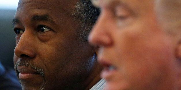 Ben Carson (L) and Republican presidential then nominee Donald Trump speak during a round table with the Republican Leadership Initiative at Trump Tower in the Manhattan borough of New York, U.S. August 25, 2016.  REUTERS/Carlo Allegri/File Photo