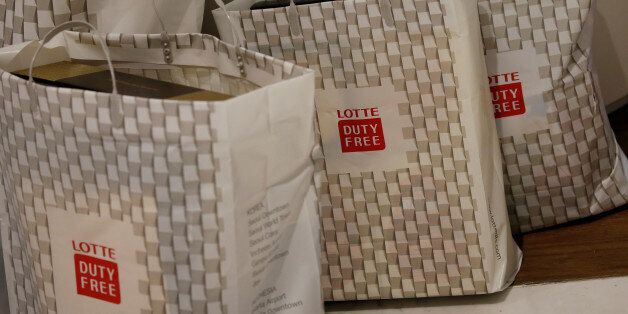 Shopping bags are seen at a Lotte duty free shop in Seoul, South Korea, December 13, 2016. Picture taken December 13, 2016. REUTERS/Kim Hong-Ji