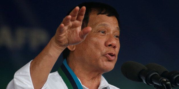 Philippine Pesident Rodrigo Duterte speaks during the change of command for the new Armed Forces chief at a military camp  in Quezon city, Metro Manila, December 7, 2016. REUTERS/Erik De Castro