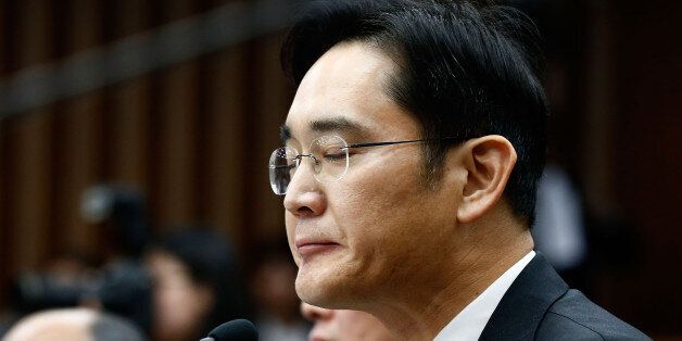 SEOUL, SOUTH KOREA - DECEMBER 06:  Lee Jae-Yong, vice chairman of Samsung answers questions during a parliamentary hearing of the probe in Choi Soon-sil gate at the National Assembly on December 6, 2016 in Seoul, South Korea. South Korea started the parliament hearing with leaders of nine South Korean conglomerates including Samsung, Hyundai, Lotte over the tens of millions of dollars given to foundations controlled by Ms Park's friend Choi Soon-sil, the woman at the center of the scandal.  (Pho