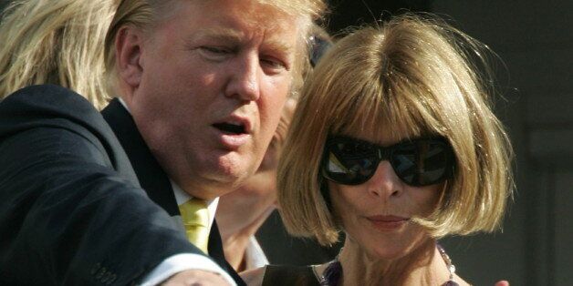 Businessman Donald Trump (L) and Anna Wintour editor in chief of Vogue attend the men's final at the U.S. Open tennis tournament in Flushing Meadows, New York, September 11, 2005.