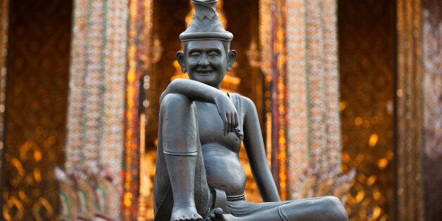 Thailand, Bangkok, smiling statue in Grand Palace