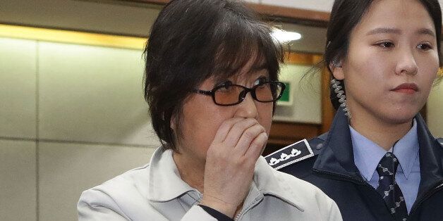 SEOUL, SOUTH KOREA - JANUARY 05:  Choi Soon-Sil, the jailed confidante of disgraced South Korean President Park Geun-Hye, appears for her first trial at the Seoul Central District Court on January 5, 2017 in Seoul, South Korea. Choi Soon-sil, the close friend of President Park Geun-hye, who is at the center of possible corruption scandal that has been leading the president's impeachment appeared at the court hearing.  (Photo by Chung Sung-Jun/Getty Images)