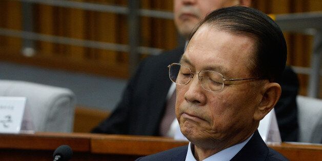 SEOUL, SOUTH KOREA - DECEMBER 07:  Former presidential chief of staff Kim Ki-Choon attends at parliamentary hearing of the probe in Choi Soon-Sil gate at the National Assembly on December 7, 2016 in Seoul, South Korea. South Korea started the parliament hearing with leaders of nine South Korean conglomerates including Samsung, Hyundai, Lotte over the tens of millions of dollars given to foundations controlled by Ms Park's friend Choi Soon-sil, the woman at the center of the scandal.  (Photo by Kim Min-Hee-Pool/Getty Images)
