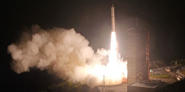 Japan's upgraded solid fuel Epsilon rocket lifts off from the Uchinoura Space Center in the town of Kimotsuki in Kagoshima Prefecture, southwestern Japan, around 8 p.m. on Dec. 20, 2016. The ERG satellite carried by the rocket was successfully released about 13 minutes later. (Photo by Kyodo News via Getty Images)