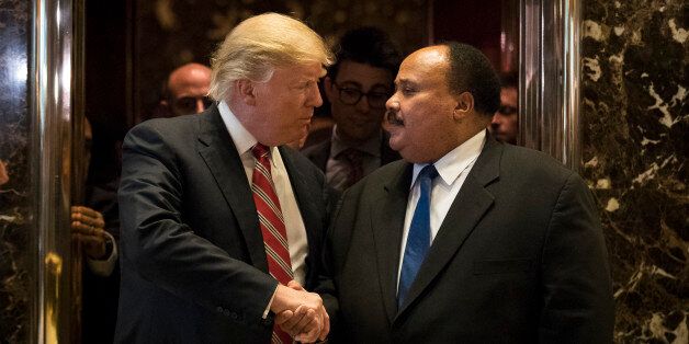 NEW YORK, NY - JANUARY 16:  President-elect Donald Trump shakes hands with Martin Luther King III after their meeting at Trump Tower, January 16, 2017 in New York City. Trump will be inaugurated as the next U.S. President this coming Friday. (Photo by Drew Angerer/Getty Images)