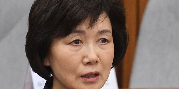 SEOUL, SOUTH KOREA - DECEMBER 15:  Choi Kyung-Hee, former president of Ewha Womans University, answers questions during a parliamentary hearing over the Choi Soon-sil gate probe at the National Assembly on December 15, 2016 in Seoul, South Korea. South Korea started the fourth round of a parliament hearing on the corruption scandal involving impeached President Park Geun-Hye.  (Photo by Kim Min-Hee-Pool/Getty Images)