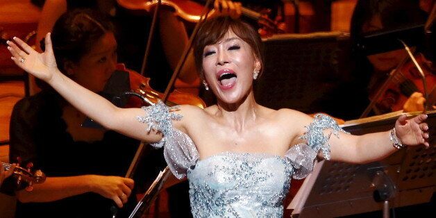 South Korean soprano singer Sumi Jo performs during the gala concert of the 50th anniversary of Japan and South Korea's resumption of normal ties after World War II at Suntory Hall in Tokyo June 22, 2015. East Asian neighbours South Korea and Japan marked the 50th anniversary of diplomatic ties on Monday with a push to mend relations strained for years by feuds over the legacy of Japan's wartime past.  REUTERS/Shizuo Kambayashi/Pool