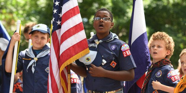 DENVER, CO - JULY 4: Isaiah Watson, middle, Hayden Auger, left, and Noah Shurz, all 9, and members of boy scout troop 286, sing the national anthem before the start of the  7th annual Park Hill Fourth of July parade that went along 23rd avenue on July 4, 2016 in Denver, Colorado. The popular parade started at and ended at Krameria streets. Over 5,000 people attended the parade. (Photo by Helen H. Richardson/The Denver Post via Getty Images)