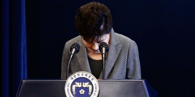 SEOUL, SOUTH KOREA - NOVEMBER 29:  South Korean President Park Geun-Hye bows during an address to the nation, at the presidential Blue House in Seoul on November 29, 2016. South Korea's scandal-hit President Park Geun-Hye said Tuesday she was willing to stand down early and would let parliament decide on her fate.  (Photo by Jeon Heon-Kyun-Pool/Getty Images)
