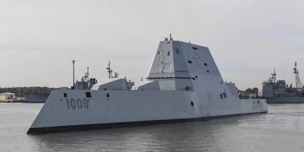 The guided-missile destroyer USS Zumwalt (DDG 1000) transits Naval Station Mayport Harbor on its way into port in Jacksonville, Florida on October 25, 2016. Crewed by 147 Sailors, Zumwalt is the lead ship of a class of next-generation destroyers designed to strengthen naval power by performing critical missions and enhancing US deterrence, power projection and sea control objectives. / AFP / US NAVY / PO2 Timothy SCHUMAKER        (Photo credit should read PO2 TIMOTHY SCHUMAKER/AFP/Getty Images)