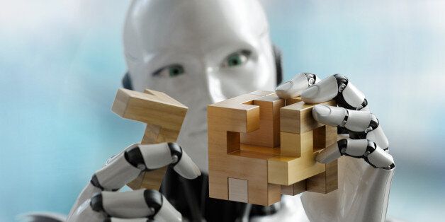 3D render os a humanoid robot trying to solve a 3D wooden puzzle. Rendered with depth of field.
