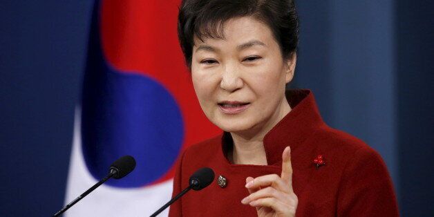 South Korean President Park Geun-hye answers questions from reporters during her New Year news conference at the Presidential Blue House in Seoul, South Korea, January 13, 2016.  REUTERS/Kim Hong-Ji