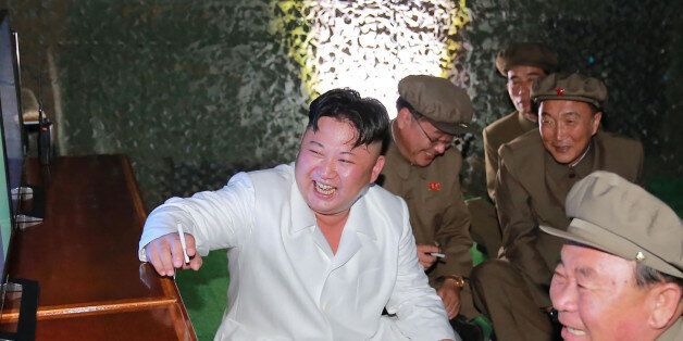 This undated picture released from North Korea's official Korean Central News Agency (KCNA) on August 25, 2016 shows North Korean leader Kim Jong-Un (C) inspecting a test-fire of strategic submarine-launched ballistic missile at an undisclosed location. / AFP / KCNA / KNS / South Korea OUT / REPUBLIC OF KOREA OUT  / SOUTH KOREA OUT ---EDITORS NOTE--- RESTRICTED TO EDITORIAL USE - MANDATORY CREDIT 'AFP PHOTO/KCNA VIA KNS' - NO MARKETING NO ADVERTISING CAMPAIGNS - DISTRIBUTED AS A SERVICE TO CLIEN