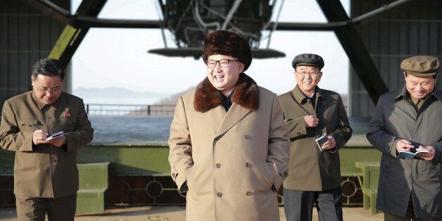 FILE PHOTO: North Korea leader Kim Jong Un smiles as he visits Sohae Space Center in Cholsan County, North Pyongan province for the testing of a new engine for an intercontinental ballistic missile (ICBM) in this undated photo released by North Korea's Korean Central News Agency (KCNA) on April 9, 2016.    REUTERS/KCNA      ATTENTION EDITORS - THIS PICTURE WAS PROVIDED BY A THIRD PARTY. REUTERS IS UNABLE TO INDEPENDENTLY VERIFY THE AUTHENTICITY, CONTENT, LOCATION OR DATE OF THIS IMAGE. FOR EDITO