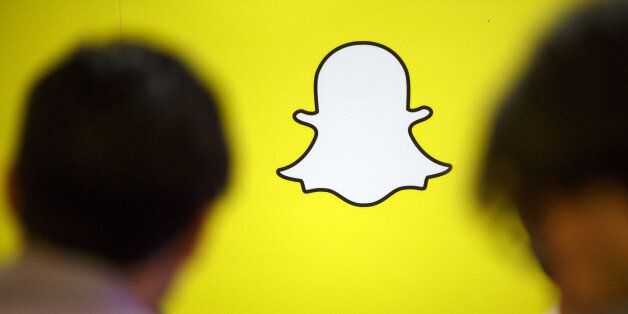 The Snapchat logo is displayed during the TechFair LA job fair in Los Angeles, California, U.S., on Thursday, Jan. 26, 2017. Filings for U.S. unemployment benefits rose more than forecast last week amid holiday-related volatility, while remaining low by historical standards. Photographer: Patrick T. Fallon/Bloomberg via Getty Images