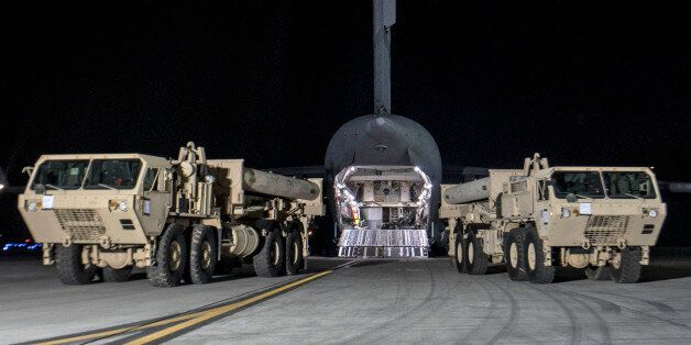 Photo provided by U.S. Forces Korea, a truck carrying parts of U.S. missile launchers and other equipment needed to set up the Terminal High Altitude Area Defense (THAAD) missile defense system arrive at the Osan base, South Korea. The U.S. military has begun moving equipment for the controversial missile defense system to ally South Korea. The announcement Tuesday by the U.S. military comes a day after North Korea test-launched four ballistic missiles into the ocean near Japan.