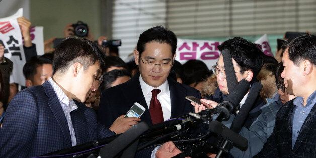 SEOUL, SOUTH KOREA - JANUARY 12:  Lee Jae-Yong, vice chairman of Samsung arrives at the office of the independent counsel on January 12, 2017 in Seoul, South Korea. The independent counsel team investigating the peddling scandal involving South Korean President Park Geun-hye and her confidant Choi Soon-sil summoned Samsung Group Vice Chairman Lee Jae-yong for questioning on charges of perjury as he allegedly lied about the money Samsung donated to Choi through multiple channels in the parliament