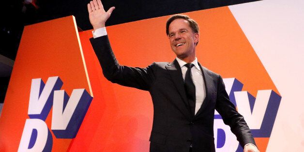 Dutch Prime Minister Mark Rutte of the VVD Liberal party appears before his supporters in The Hague, Netherlands, March 15, 2017.  REUTERS/Yves Herman      TPX IMAGES OF THE DAY
