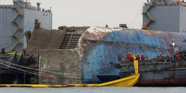 JINDO-GUN, SOUTH KOREA - MARCH 24:  Submersible vessel attempts to salvage sunken Sewol ferry in waters off Jindo, on March 24, 2017 in Jindo-gun, South Korea. The Sewol sank off the Jindo Island in April 2014 leaving more than 300 people dead and nine of them still remain missing.  (Photo by Chung Sung-Jun/Getty Images)