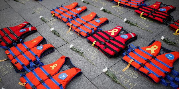 Life vests symbolising the 304 victims of sunken ferry Sewol are placed during a protest demanding South Korean President Park Geun-hye's resignation in Seoul, South Korea December 17, 2016.  REUTERS/Kim Hong-Ji