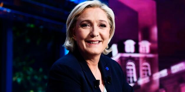 French presidential election candidate for the far-right Front National (FN) party Marine Le Pen poses before taking part in a political show titled 'Elysee 2017' on a set of French TV channel TF1 on April 25, 2017 in Boulogne-Billancourt, west of Paris.  / AFP PHOTO / Martin BUREAU        (Photo credit should read MARTIN BUREAU/AFP/Getty Images)