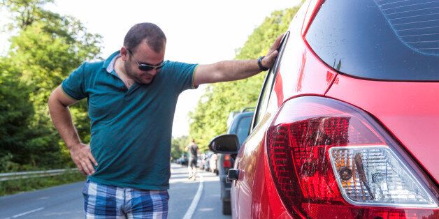 Man having a traffic nightmare on his return from vacation