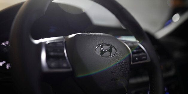 The logo of Hyundai Motor is seen on the steering wheel of a Sonata sedan car during its unveiling ceremony in Seoul, South Korea, March 8, 2017.  REUTERS/Kim Hong-Ji