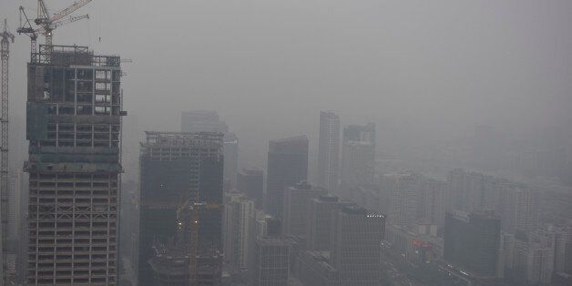 BEIJING, CHINA - APRIL 16: A general view of the centre of Beijing with a heavy cloud of pollution over the city on April 16, 2017 in Beijing, China (Ian Hitchcock/Getty Images)
