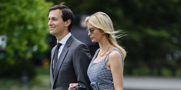 Jared Kushner and Ivanka Trump make their way across the South Lawn to board Marine One at the White House in Washington, DC on May 4, 2017. The two are travelling with US President Donald Trump to New York, NY. / AFP PHOTO / MANDEL NGAN        (Photo credit should read MANDEL NGAN/AFP/Getty Images)