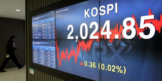 The Korea Composite Stock Price Index (Kospi) figure is displayed on a screen at the Korea Exchange (KRX) in Seoul, South Korea, on Thursday, Dec. 29, 2016. South Korea's Kospi gained 0.1 percent at closing, erasing earlier losses. Photographer: SeongJoon Cho/Bloomberg via Getty Images