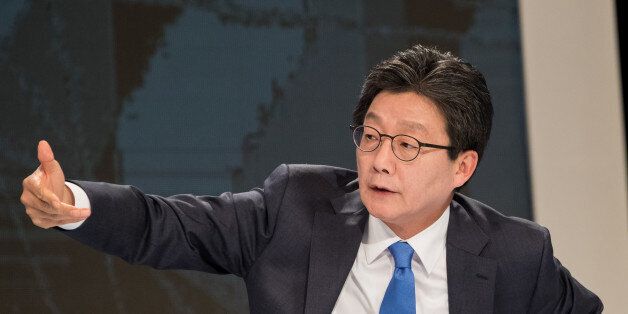 Yoo Seung-min, presidential candidate of the Bareun Party, gestures before a televised presidential debate in Seoul, South Korea, on Friday, April 28, 2017. Most candidates to replace former President Park Geun-hye in a May 9 election have called for overhauling the family-run conglomerates known as chaebol that helped transform the nation into Asia's fourth-biggest economy following the Korean War. Photographer: SeongJoon Cho/Bloomberg via Getty Images