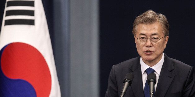 Moon Jae-in, South Korea's president, speaks during a news conference at the presidential Blue House in Seoul, South Korea, on Wednesday, May 10, 2017. Moon pledged to push for peace with North Korea and get tough on South Korea's biggest companies in his first remarks as president after a resounding election win. Photographer: Yao Qilin/Pool via Bloomberg