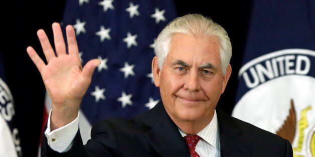 U.S. Secretary of State Rex Tillerson waves after delivering remarks to the employees at the State Department in Washington, U.S., May 3, 2017. REUTERS/Yuri Gripas