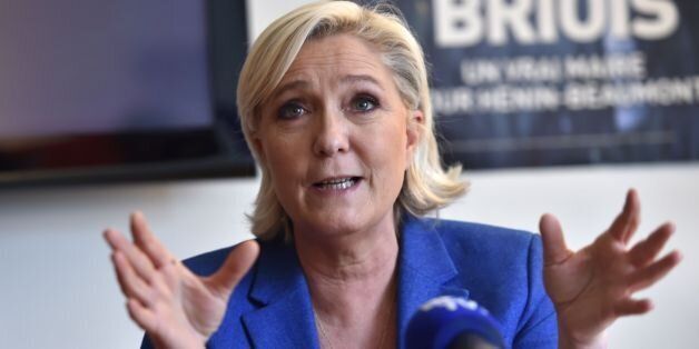Marine Le Pen, leader of the far-right Front National (FN) party and candidate in the Pas-de-Calais department for the upcoming parliamentary elections, delivers a press conference in Henin-Beaumont on May 19, 2017. French far-right leader Marine Le Pen, who lost the presidential election, said on May 18 she will run in next month's parliamentary election in which her National Front party hopes to become the leading opposition force. / AFP PHOTO / Philippe HUGUEN        (Photo credit should read
