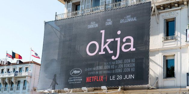 CANNES, FRANCE - MAY 16:  A view of 'Okja' film signage during the 70th annual Cannes Film Festival at  on May 16, 2017 in Cannes, France.  (Photo by Matthias Nareyek/Getty Images)