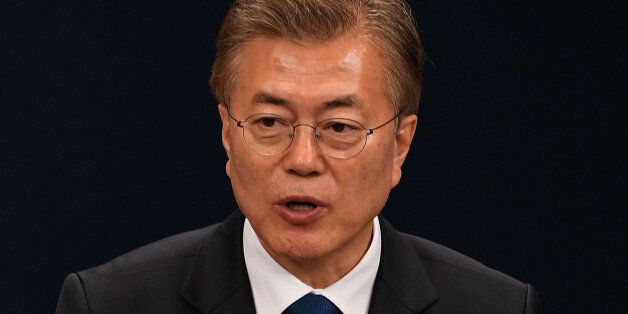 SEOUL, SOUTH KOREA - MAY 10:  South Korea's new President Moon Jae-In speaks during a press conference at the presidential Blue House on May 10, 2017 in Seoul, South Korea. Moon Jae-in of Democratic Party, was elected as the new president of South Korea in the election held on May 9, 2017.  (Photo by Kim Min-Hee-Pool/Getty Images)